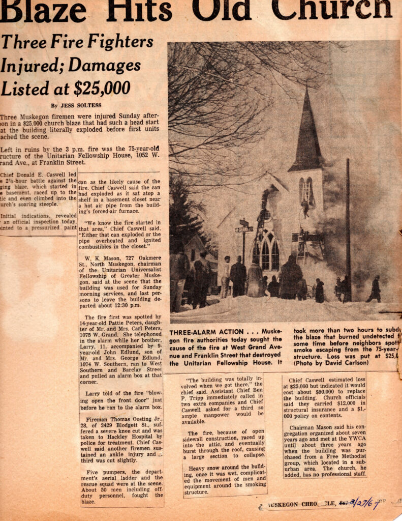A yellowed newspaper article titled "Blaze Hits Old Church."  The accompanying image shows smoke billowing from the building while firefighters climb ladders and parishioners gather in the snow outside.